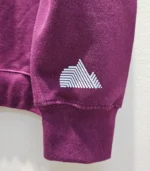 burgundy sleeve logo